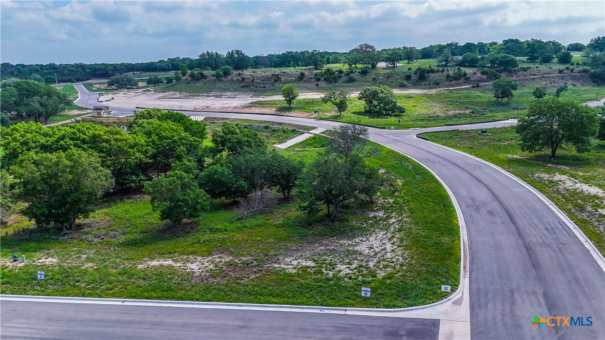 Tbd Tbd Kolleru Trail Belton, TX 76513 - Photo 2 of 19 a view of a lake with houses in the back