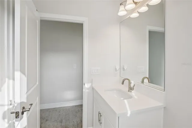 a utility room with a sink dryer and washer