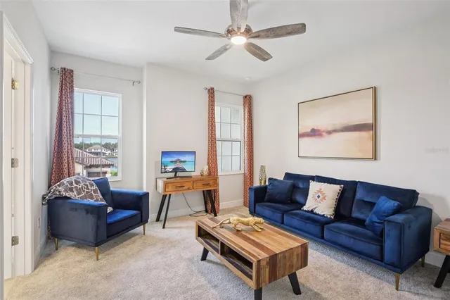 a bedroom with a bed and dresser