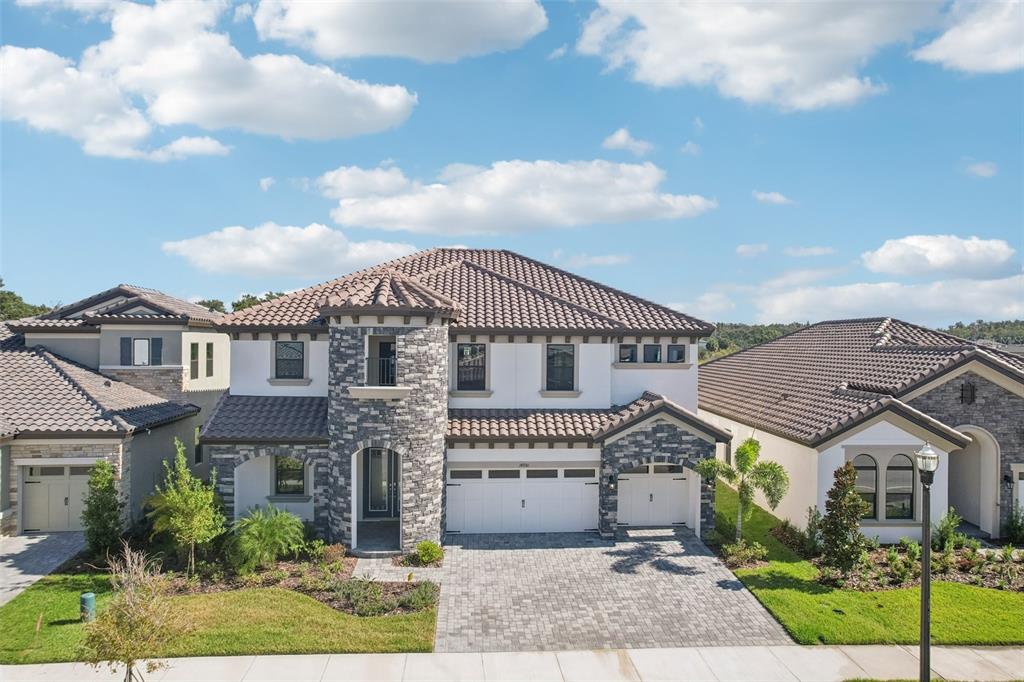 14930 Rider Pass Drive Lithia, FL 33547 - Photo 51 of 63 a front view of a house with a garden