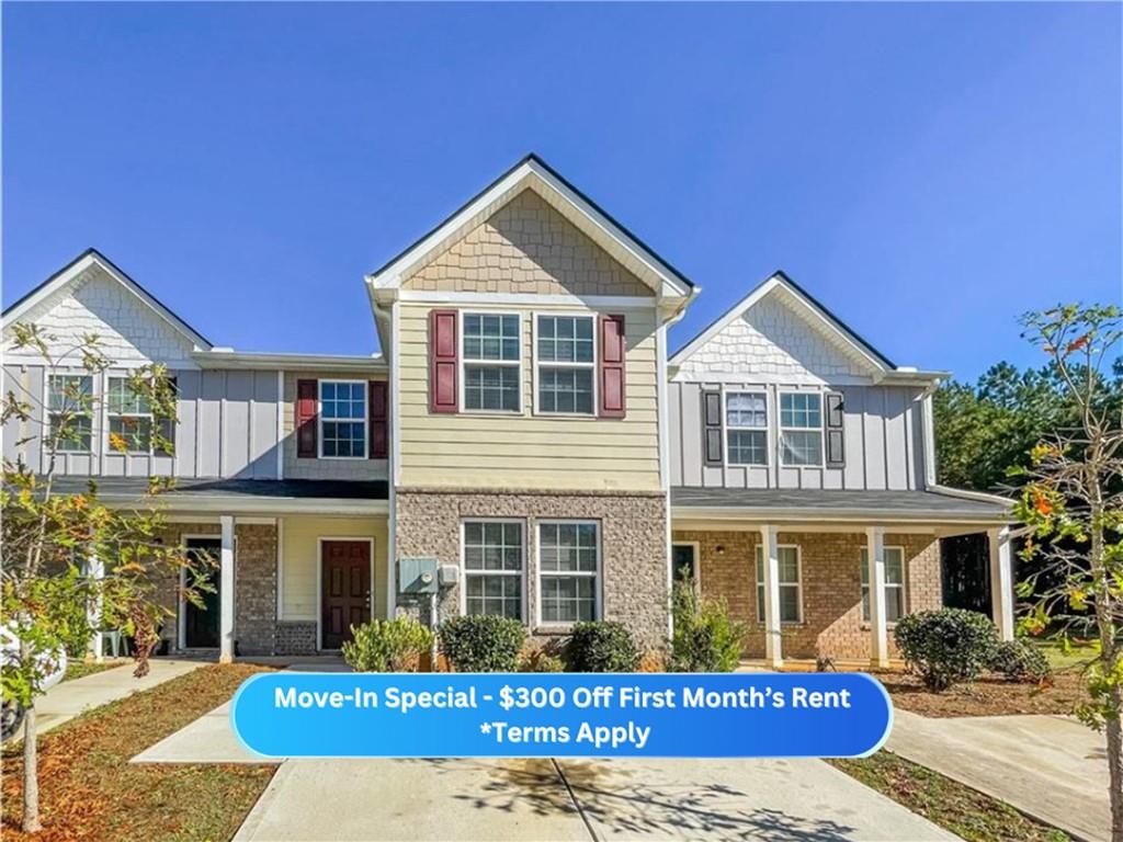 2565 Piering Drive Lithonia, GA 30038 - Photo 1 of 20 a front view of a house with yard