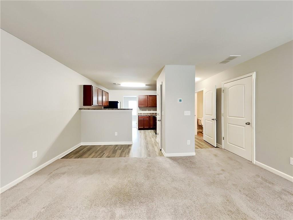 2565 Piering Drive Lithonia, GA 30038 - Photo 5 of 20 a view of a big room with closet and windows