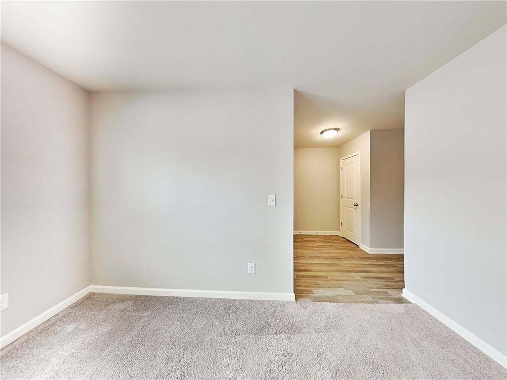 2565 Piering Drive Lithonia, GA 30038 - Photo 9 of 20 a view of an empty room and wooden door