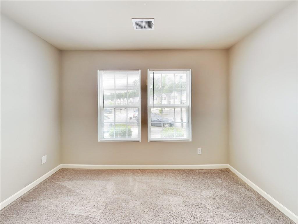 2565 Piering Drive Lithonia, GA 30038 - Photo 10 of 20 an empty room with a window
