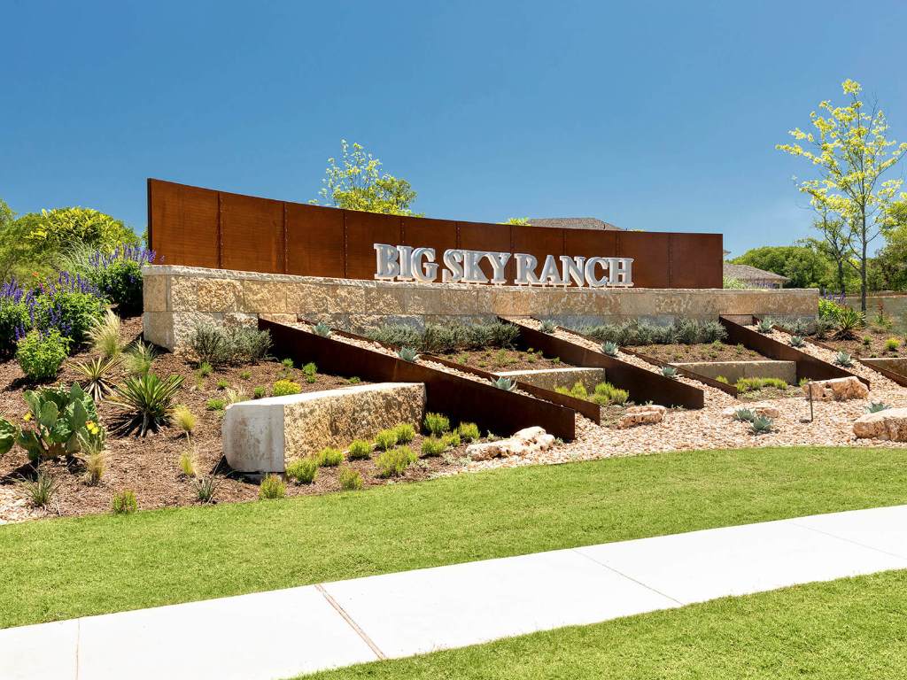 454 El Capitan Loop Dripping Springs, TX 78620 - Photo 24 of 26 Community / neighborhood sign featuring a yard