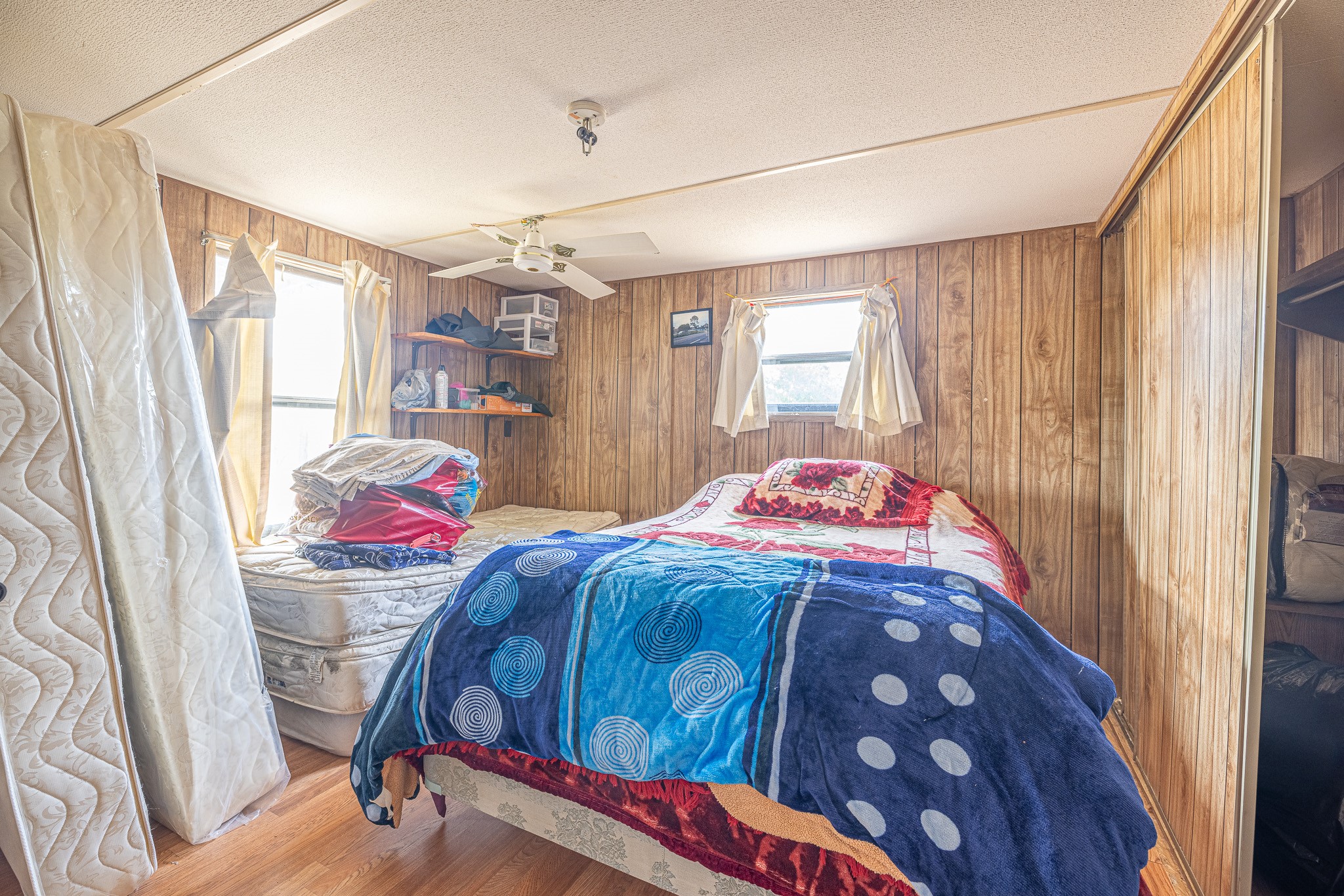 1313 Greenbriar Road Madisonville, TX 77864 - Photo 22 of 25 a bedroom with a bed and a window