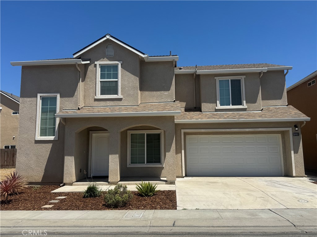 1339 Playa Del Rey Drive Merced, CA 95348 - Photo 2 of 48 a front view of a house with yard