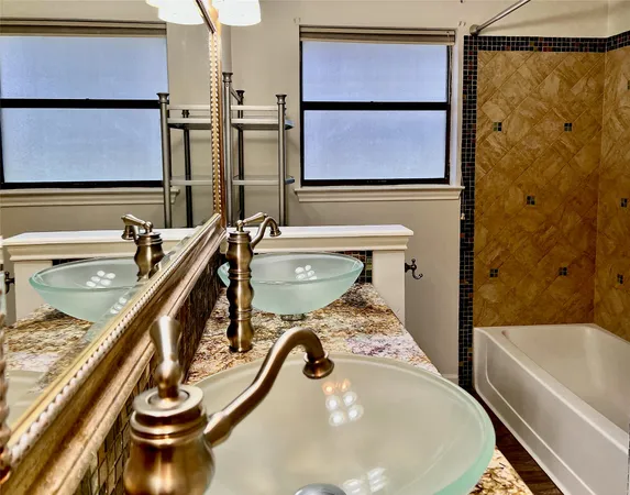 a bathroom with a sink and a bathtub