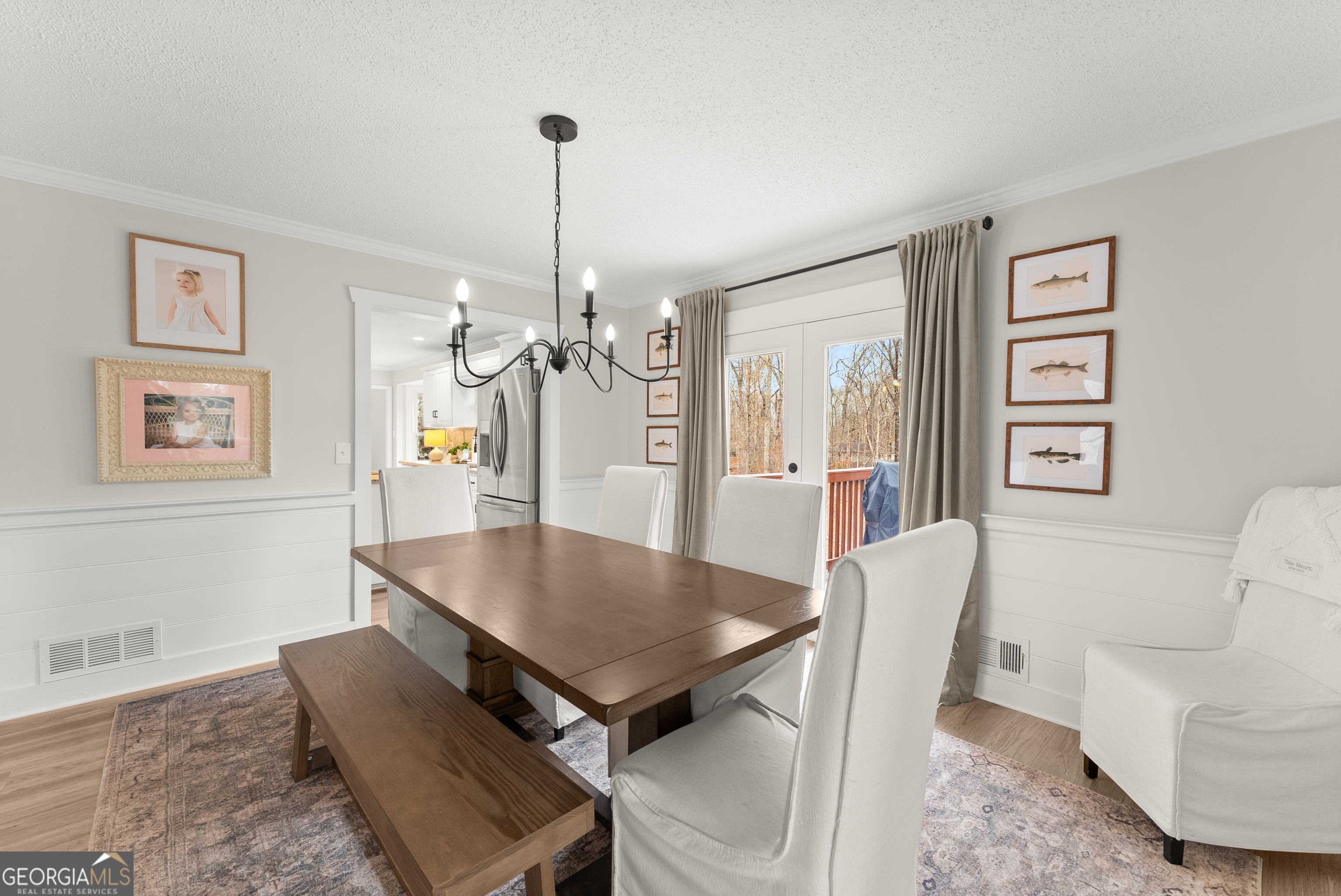 1165 Antioch Campground Road Gainesville, GA 30506 - Photo 13 of 65 a view of a dining room with furniture window and wooden floor