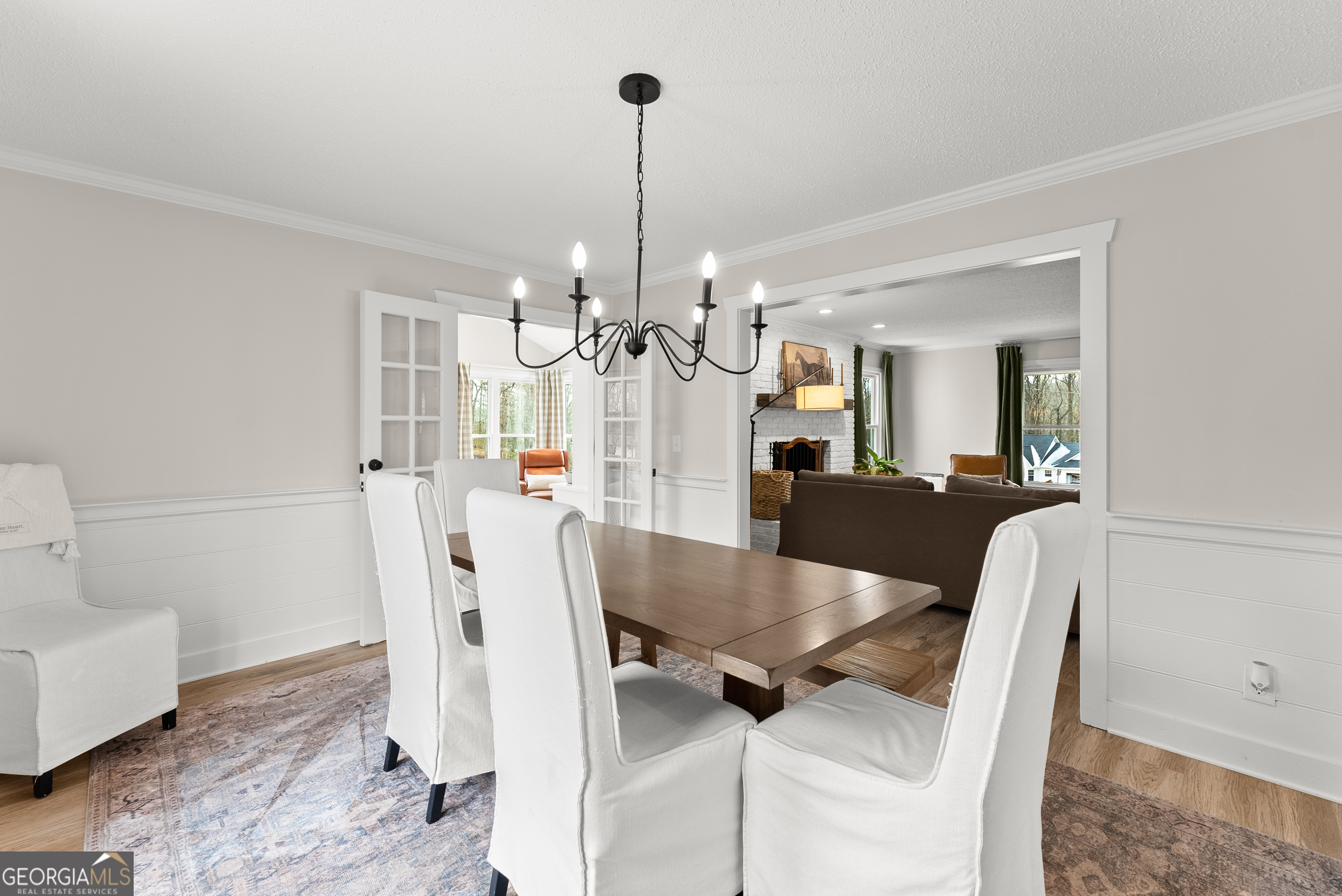 1165 Antioch Campground Road Gainesville, GA 30506 - Photo 14 of 65 a view of a dining room with furniture and a chandelier