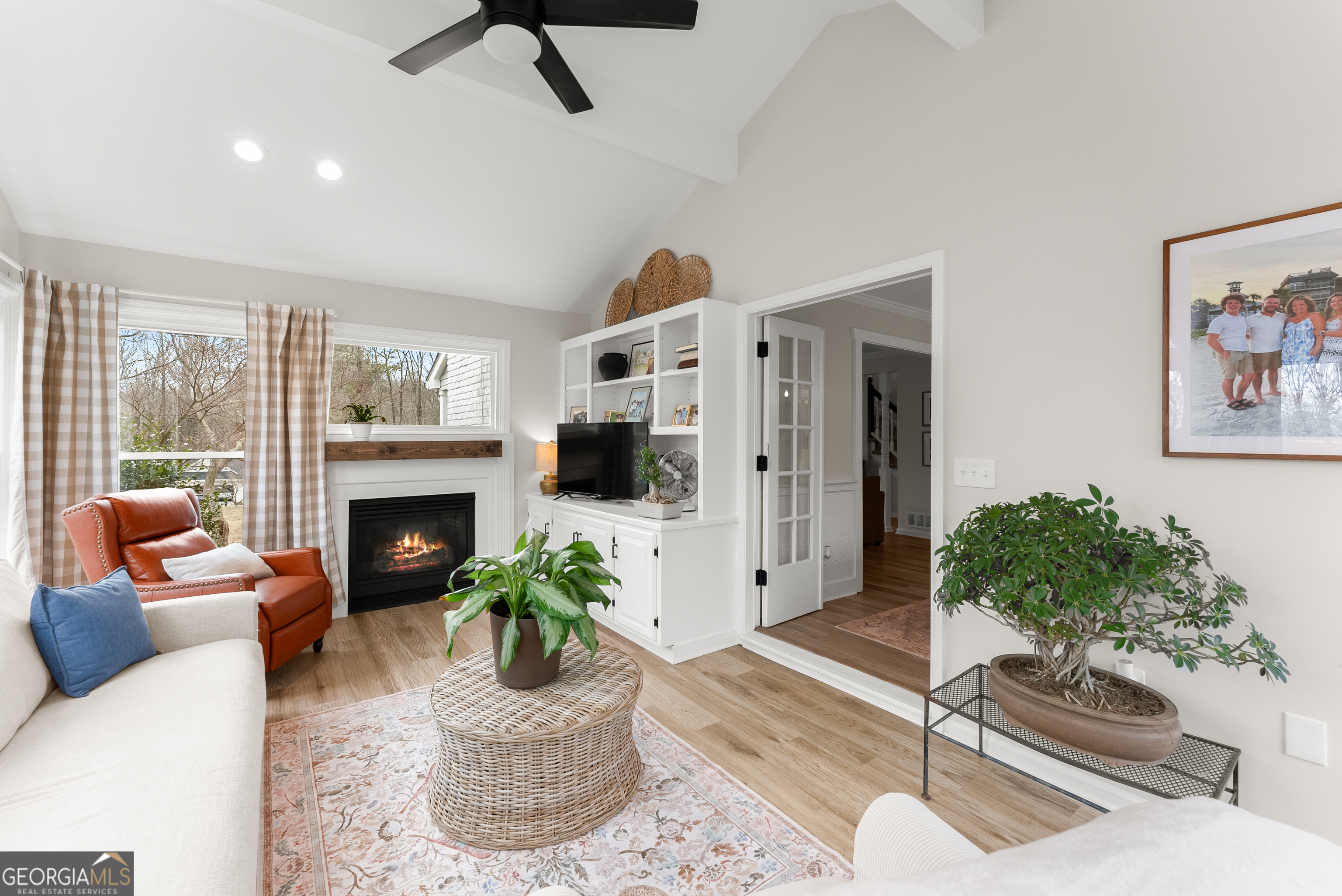 1165 Antioch Campground Road Gainesville, GA 30506 - Photo 16 of 65 a living room with furniture and a fireplace