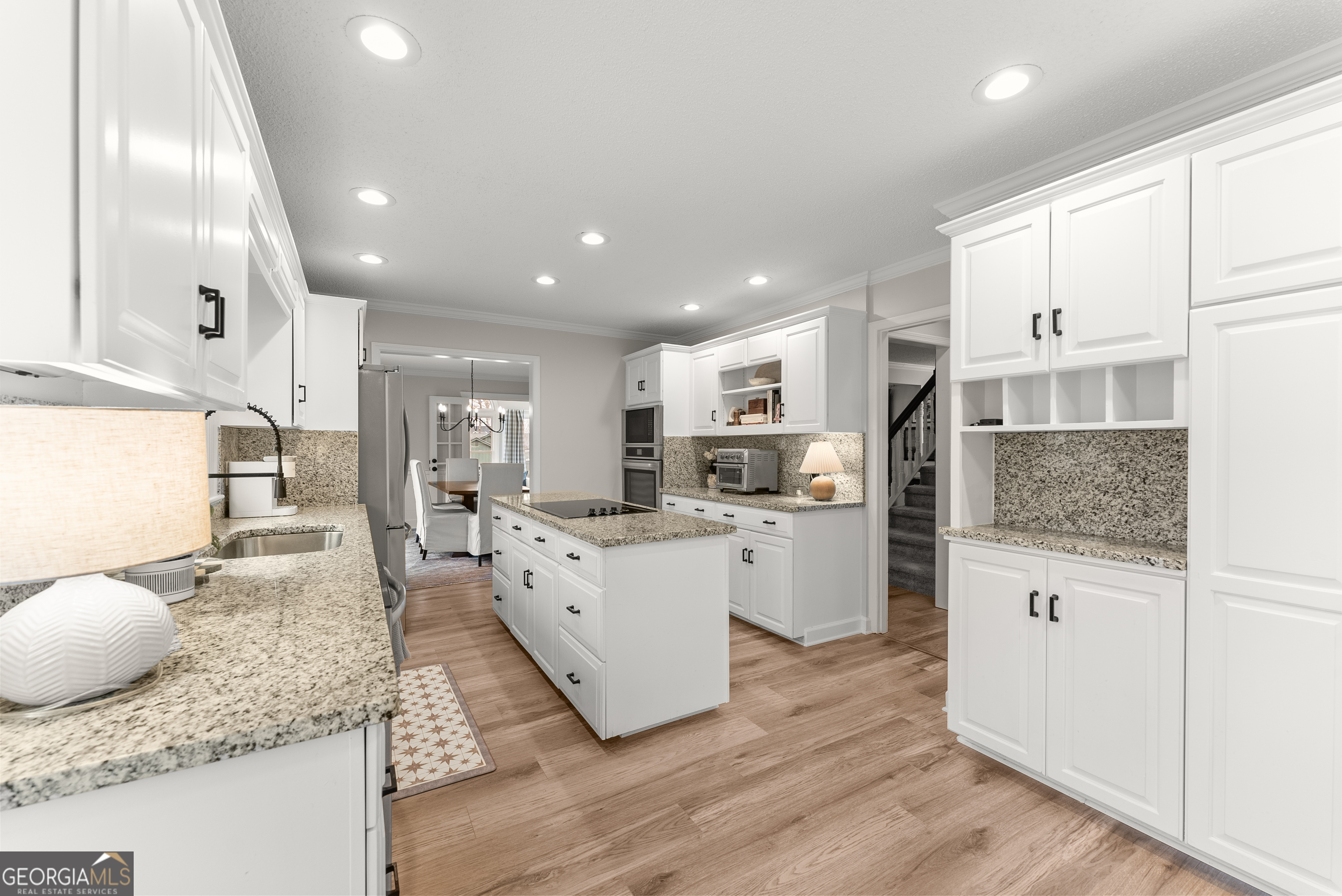 1165 Antioch Campground Road Gainesville, GA 30506 - Photo 22 of 65 a kitchen with stainless steel appliances granite countertop refrigerator sink and stove