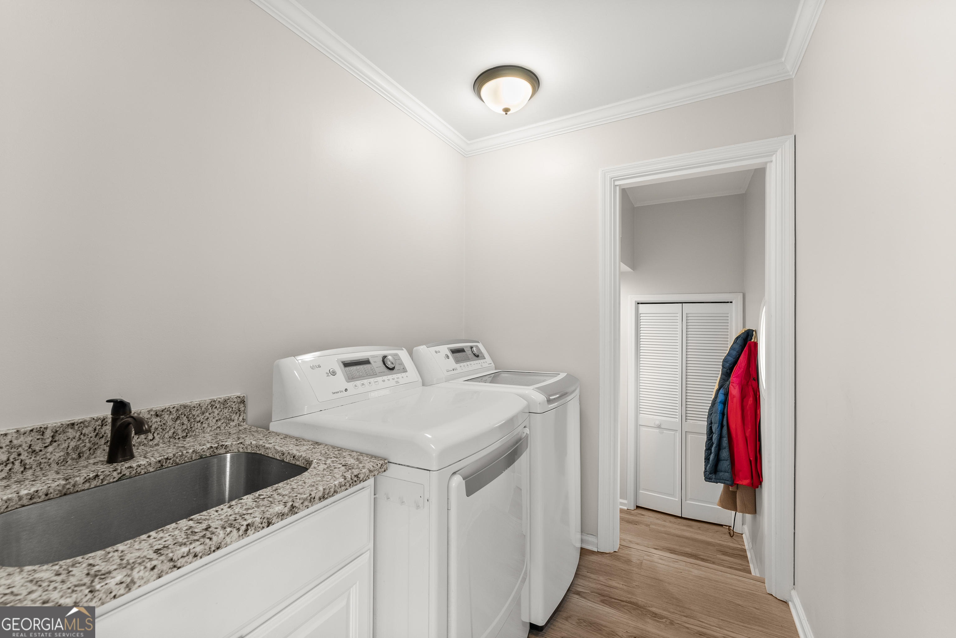 1165 Antioch Campground Road Gainesville, GA 30506 - Photo 25 of 65 a view of a storage & utility room with a sink