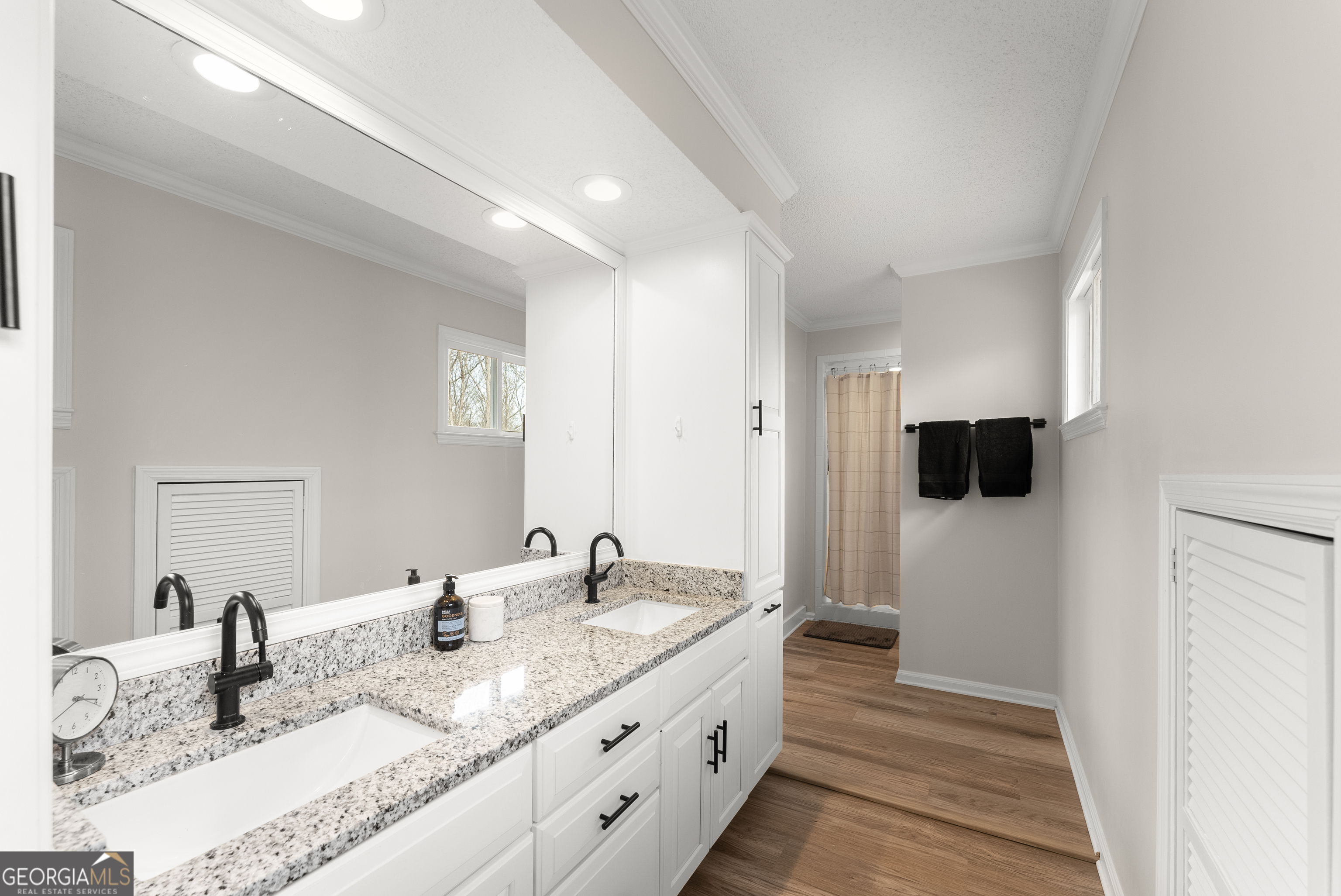 1165 Antioch Campground Road Gainesville, GA 30506 - Photo 35 of 65 a bathroom with a granite countertop sink and a mirror