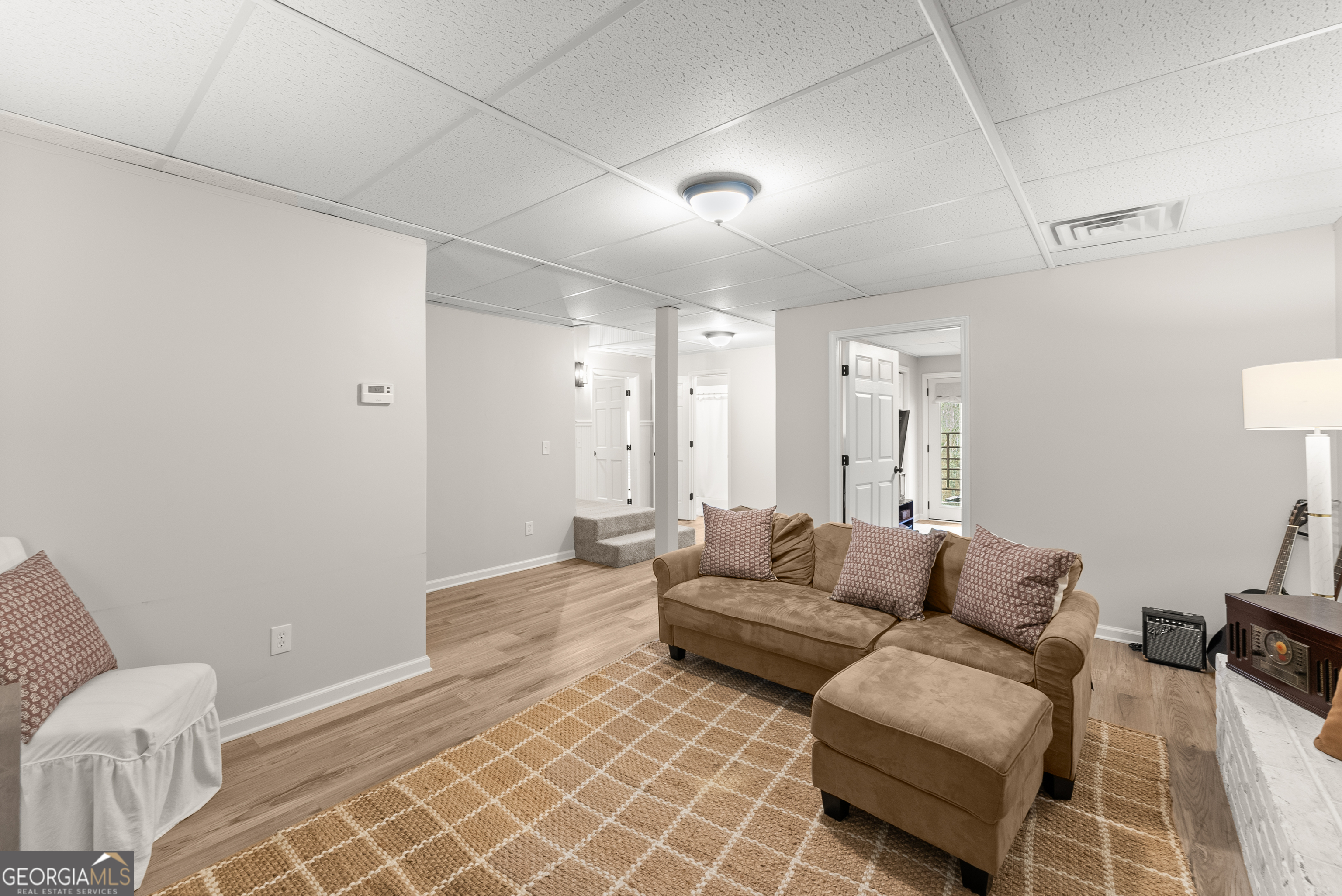 1165 Antioch Campground Road Gainesville, GA 30506 - Photo 43 of 65 a living room with furniture and a couch