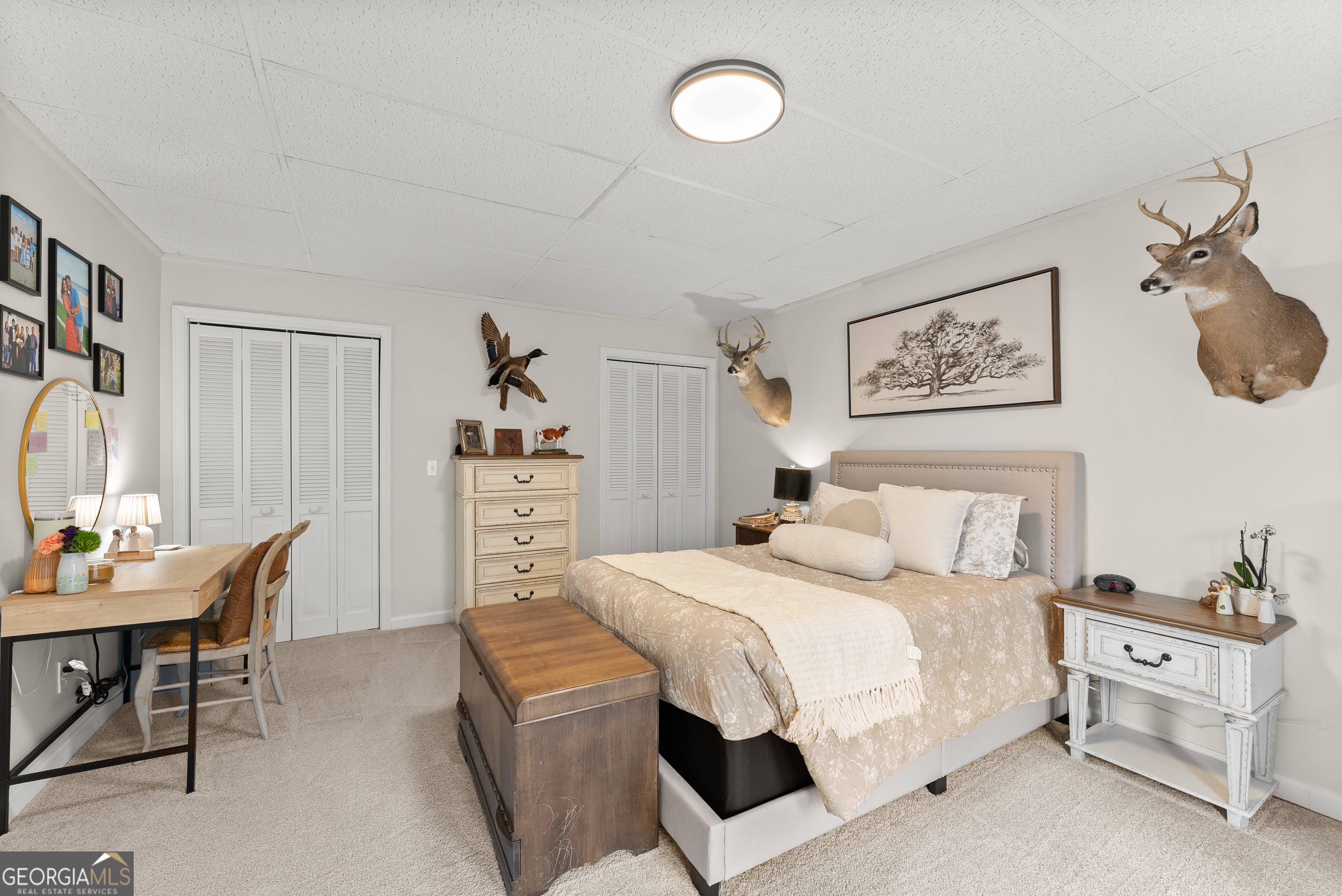 1165 Antioch Campground Road Gainesville, GA 30506 - Photo 44 of 65 a bedroom with a bed and a desk