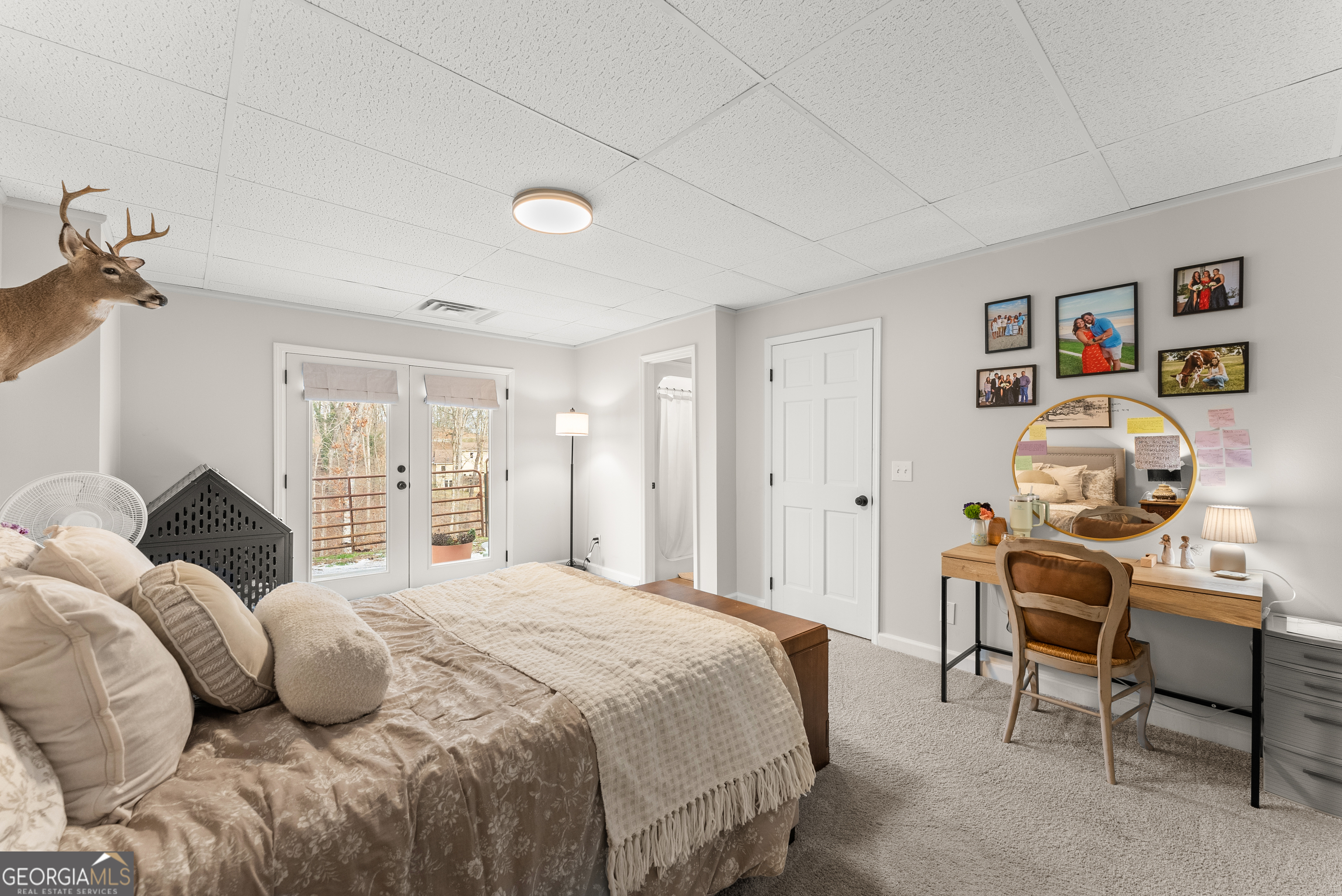 1165 Antioch Campground Road Gainesville, GA 30506 - Photo 45 of 65 a bedroom with a bed and a window