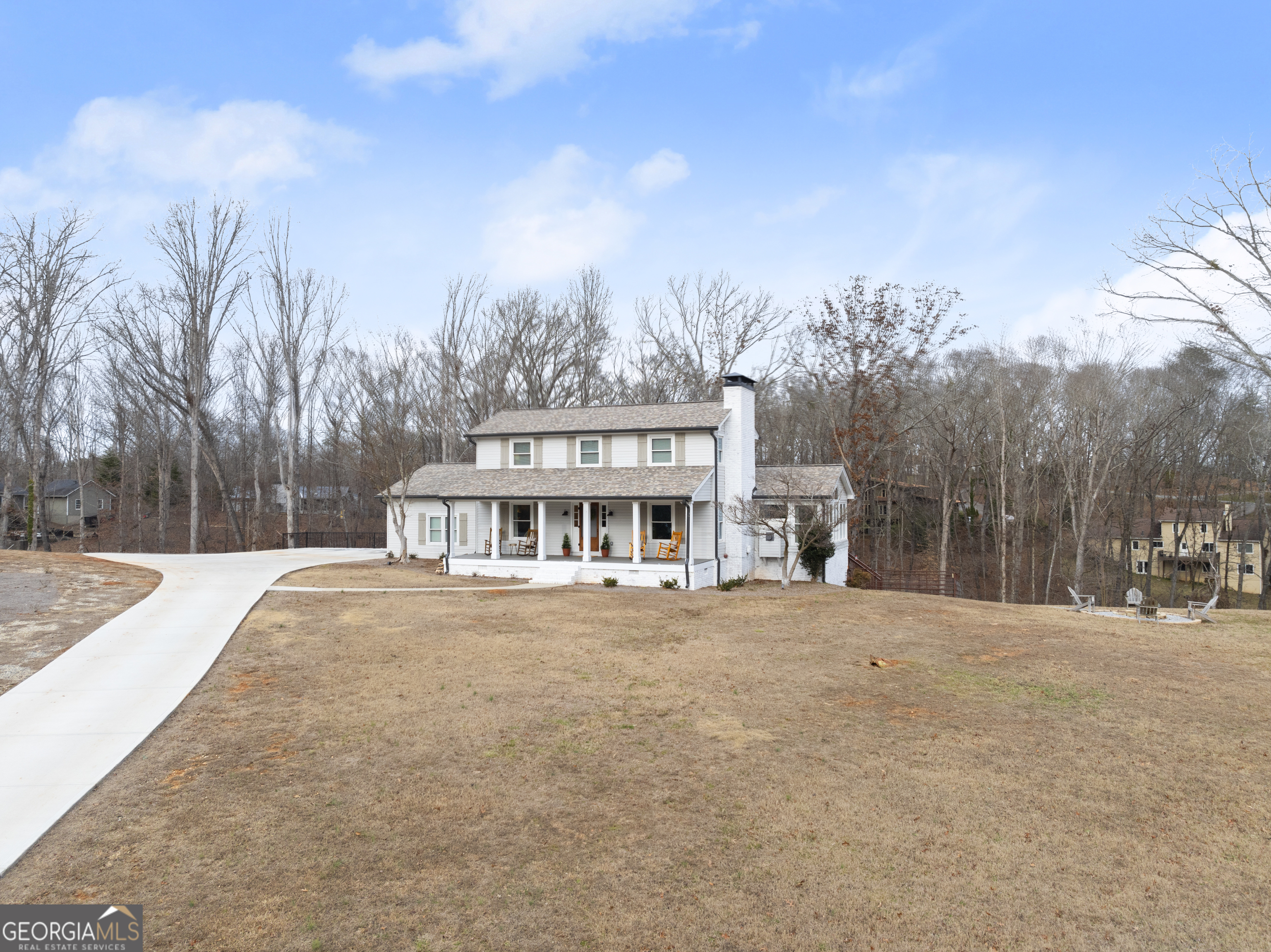 1165 Antioch Campground Road Gainesville, GA 30506 - Photo 6 of 65 a front view of house with yard and trees around