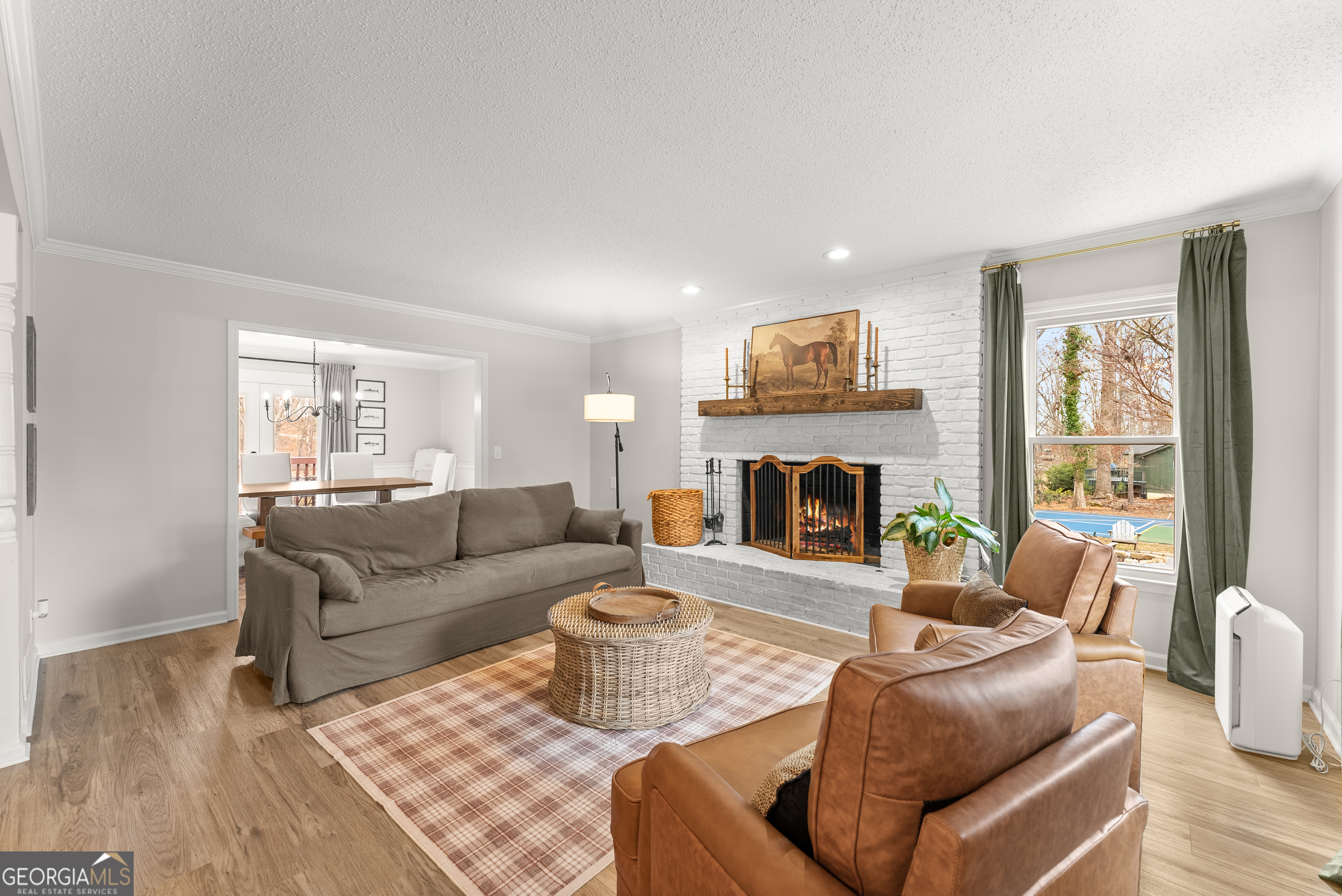 1165 Antioch Campground Road Gainesville, GA 30506 - Photo 10 of 65 a living room with furniture and a fireplace
