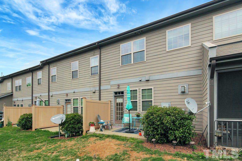 2456 Baslow Drive Apex, NC 27539 - Photo 33 of 39 a view of a house with backyard