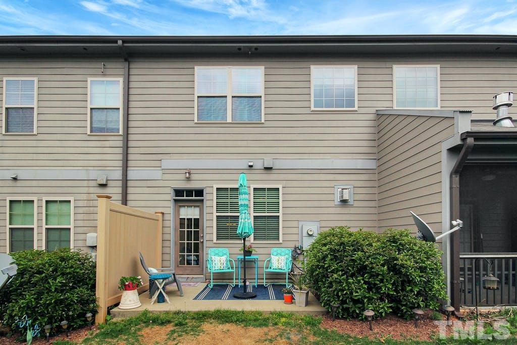 2456 Baslow Drive Apex, NC 27539 - Photo 34 of 39 a front view of a house with sitting area