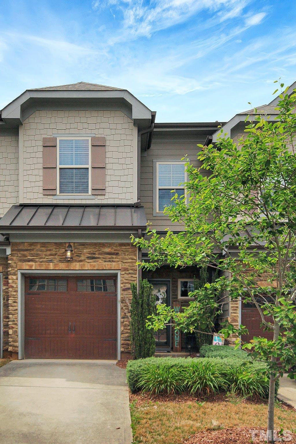 2456 Baslow Drive Apex, NC 27539 - Photo 35 of 39 a front view of a house with a yard