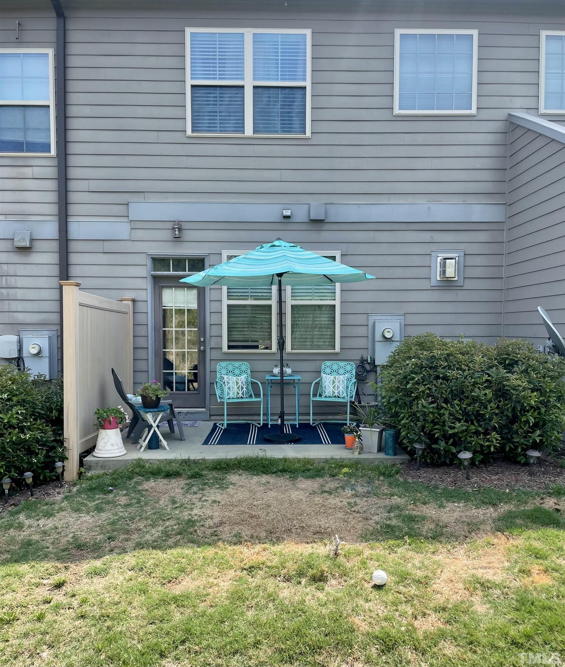 2456 Baslow Drive Apex, NC 27539 - Photo 5 of 39 a view of a house with a yard and sitting area