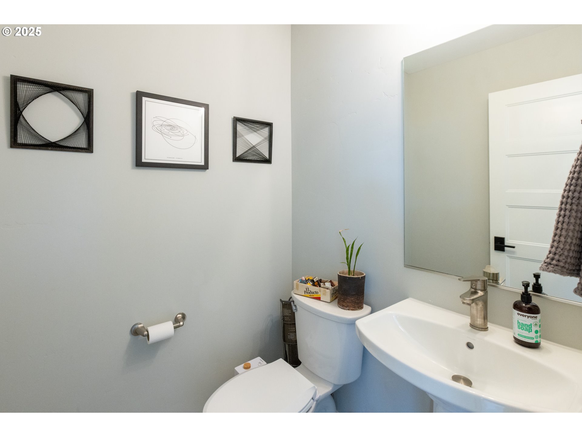 1221 30th Street Hood River, OR 97031 - Photo 30 of 46 a bathroom with a sink mirror vanity and toilet