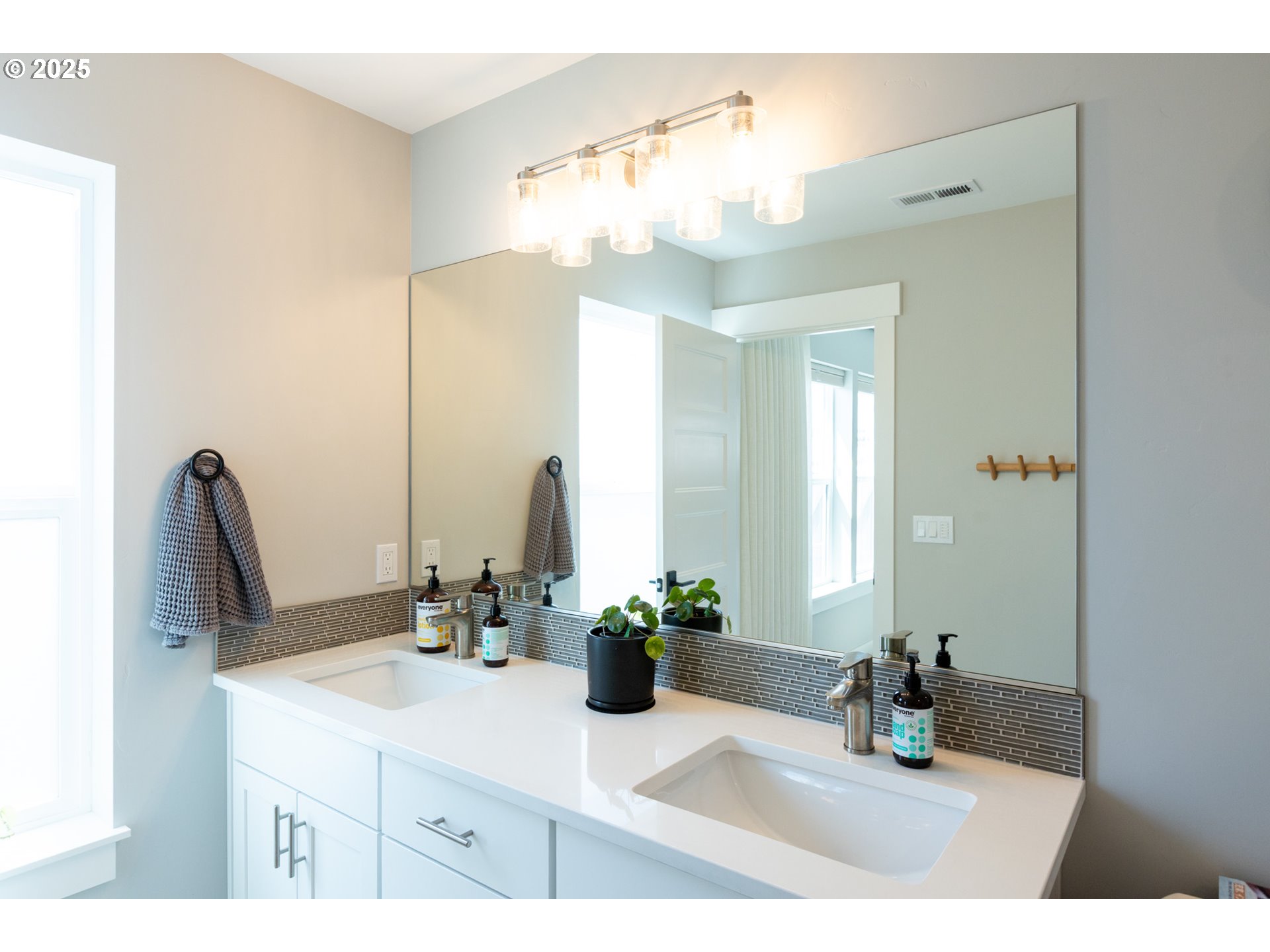 1221 30th Street Hood River, OR 97031 - Photo 36 of 46 a bathroom with a sink a vanity and a mirror
