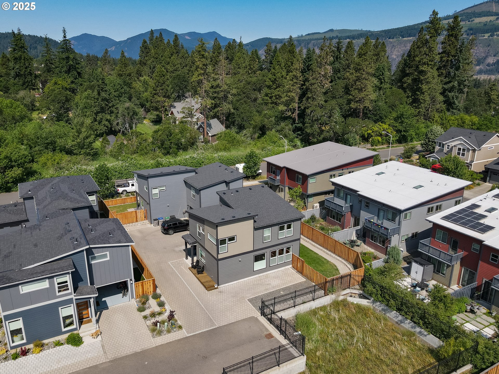 1221 30th Street Hood River, OR 97031 - Photo 4 of 46 an aerial view of a house with swimming pool and a yard