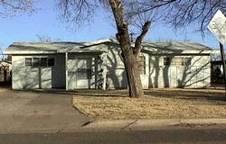 4217 Bowie Street Amarillo, TX 79110 - Photo 1 of 1 a front view of a house with garden