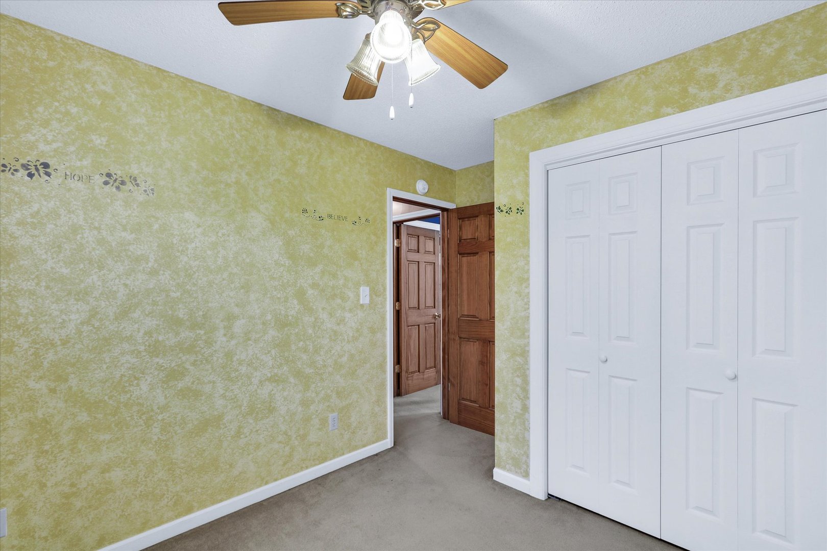 502 Richard Court Mahomet, IL 61853 - Photo 14 of 31 a bathroom with a shower and a ceiling fan