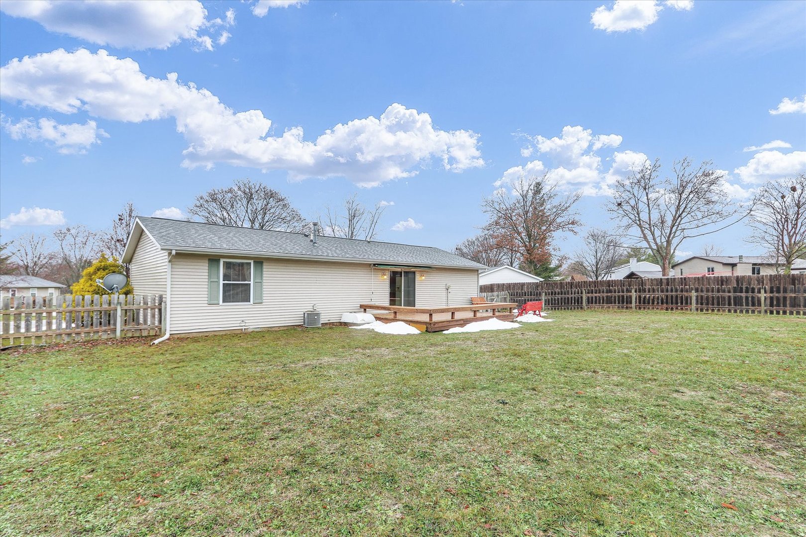 502 Richard Court Mahomet, IL 61853 - Photo 22 of 31 a view of a house with a yard and a garage