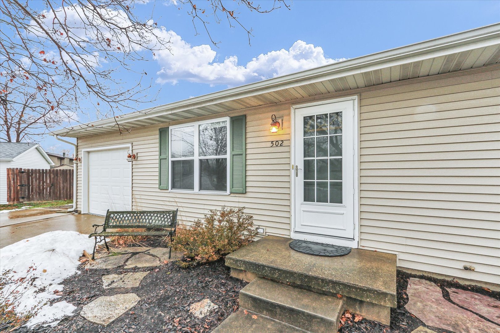 502 Richard Court Mahomet, IL 61853 - Photo 5 of 31 a front view of a house with a yard