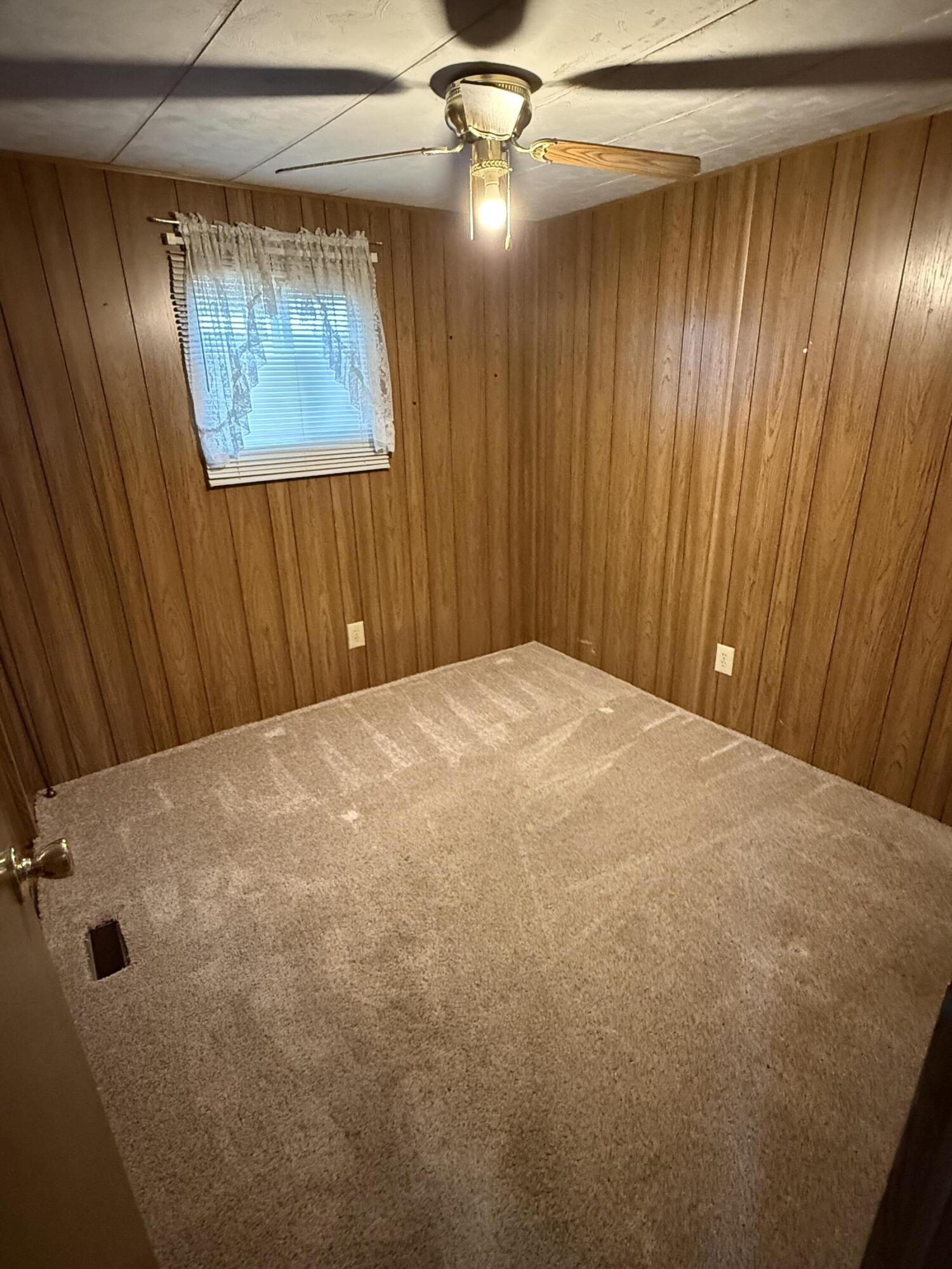 421 Stevens Road, Unit 20 Eagle Point, OR 97524 - Photo 9 of 22 a view of a room with a ceiling fan