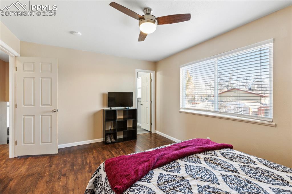 14 Duncan Road Pueblo, CO 81001 - Photo 10 of 26 a bedroom with a bed and a flat screen tv