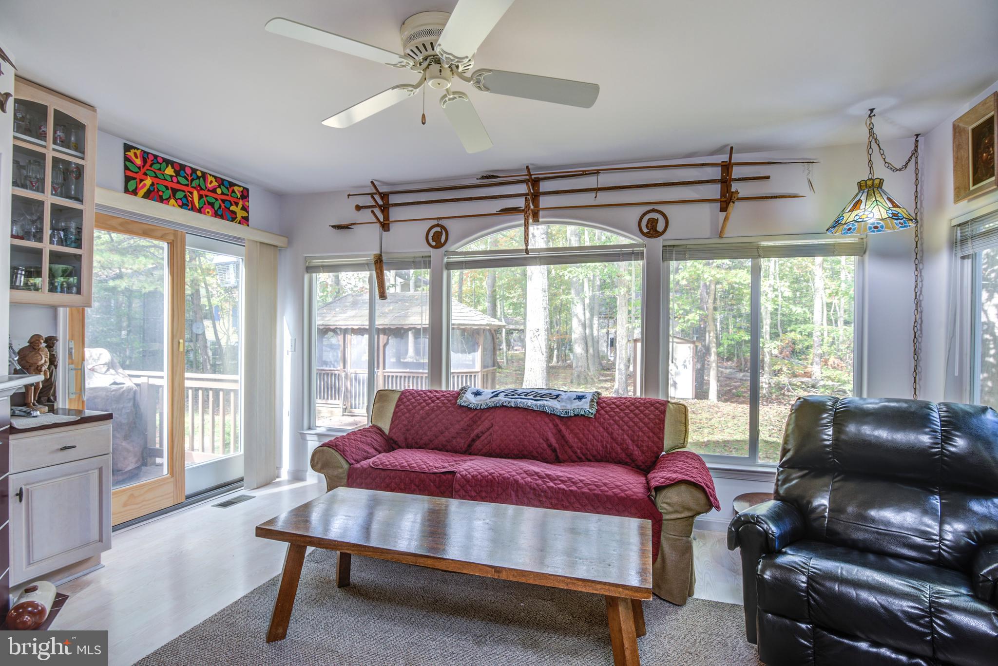 64 Windjammer Road Ocean Pines, MD 21811 - Photo 32 of 54 Inviting sunroom with wet bar and fireplace!