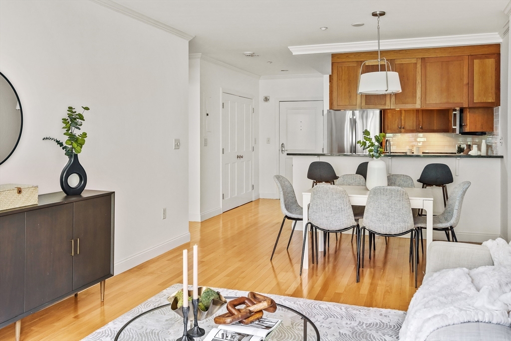 2-14 St Paul Street, Unit 311 Brookline, MA 02446 - Photo 9 of 29 a view of a dining room with furniture