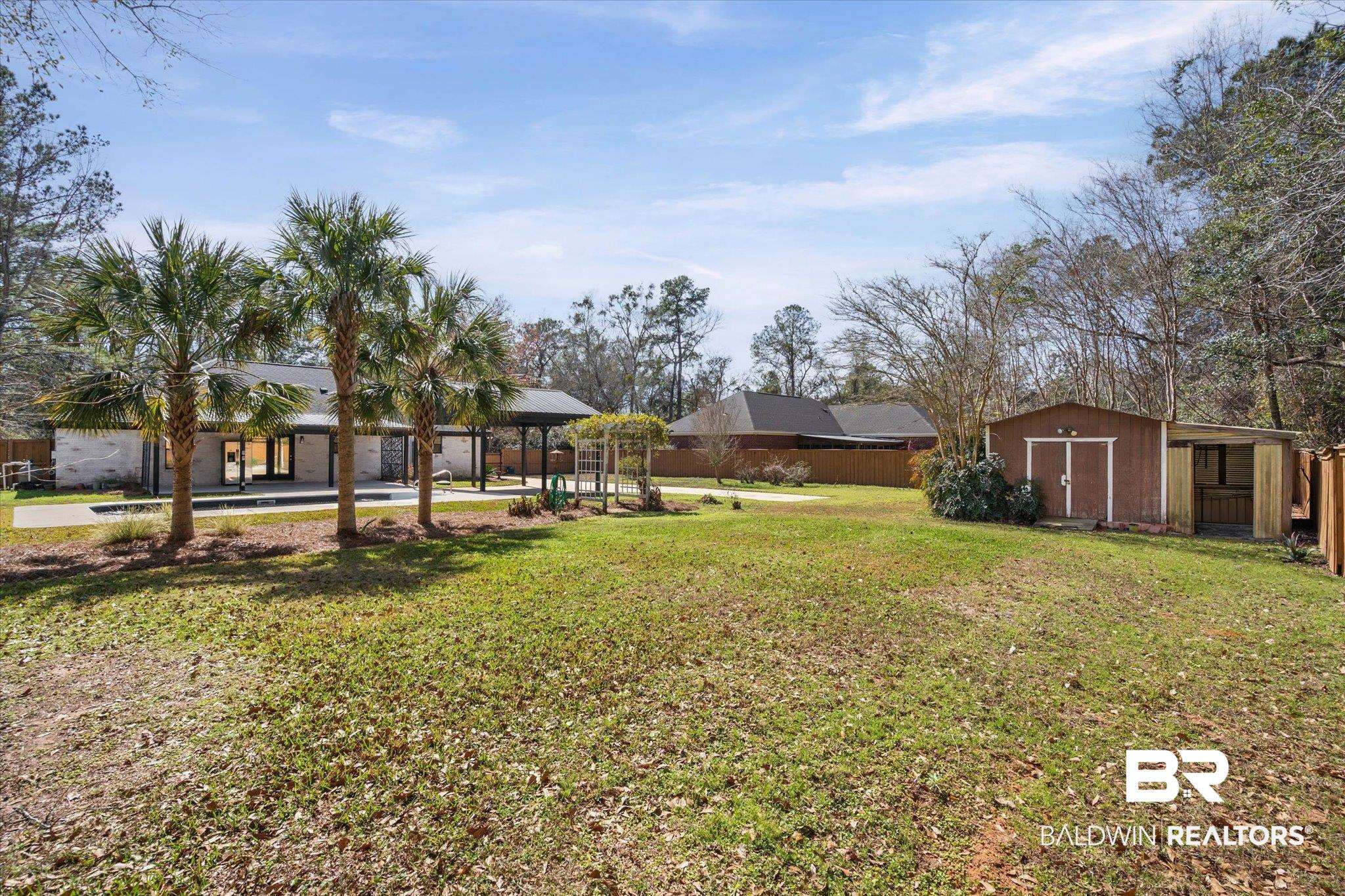 3216 Bay Booster Club Road Theodore, AL 36582 - Photo 29 of 46 View of yard with a storage shed