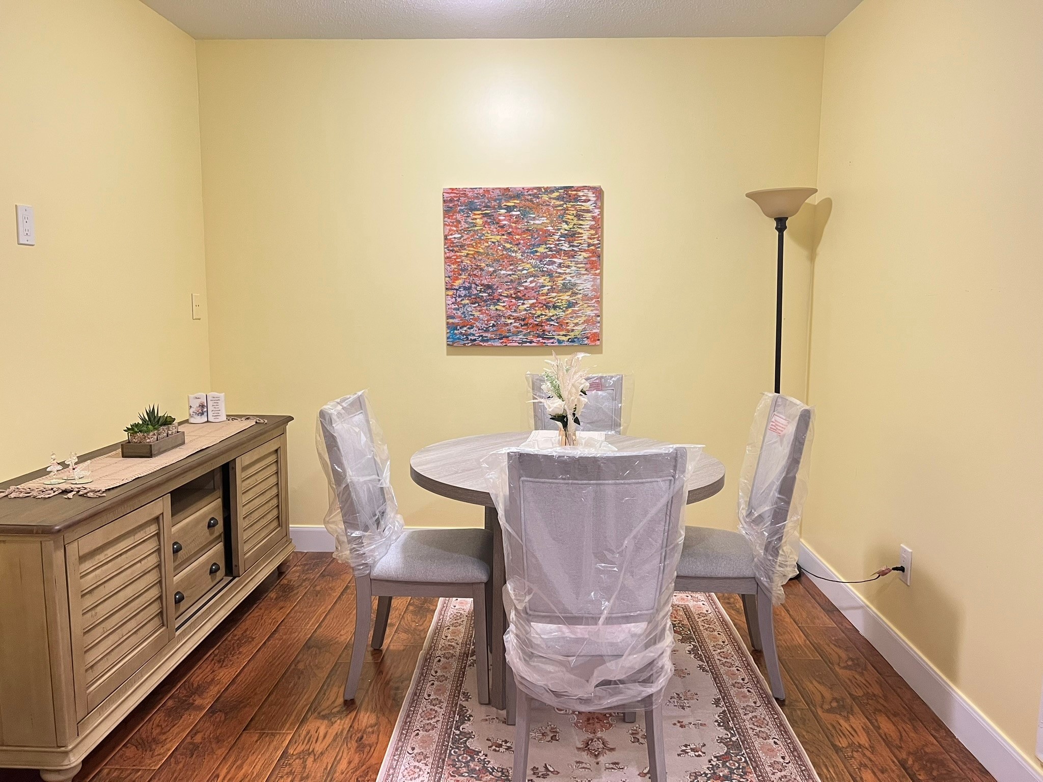 2230 South Piney Point Road, Unit 219 Houston, TX 77063 - Photo 6 of 15 a view of a dining room with furniture and wooden floor