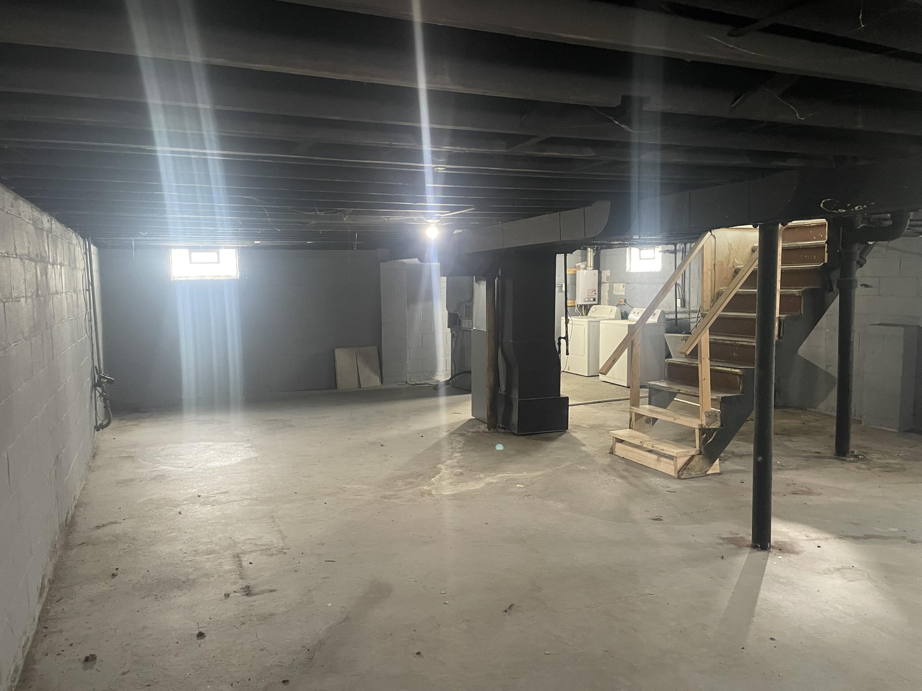 4203 East 12th Place Gary, IN 46403 - Photo 14 of 15 a view of an empty room with wooden floor