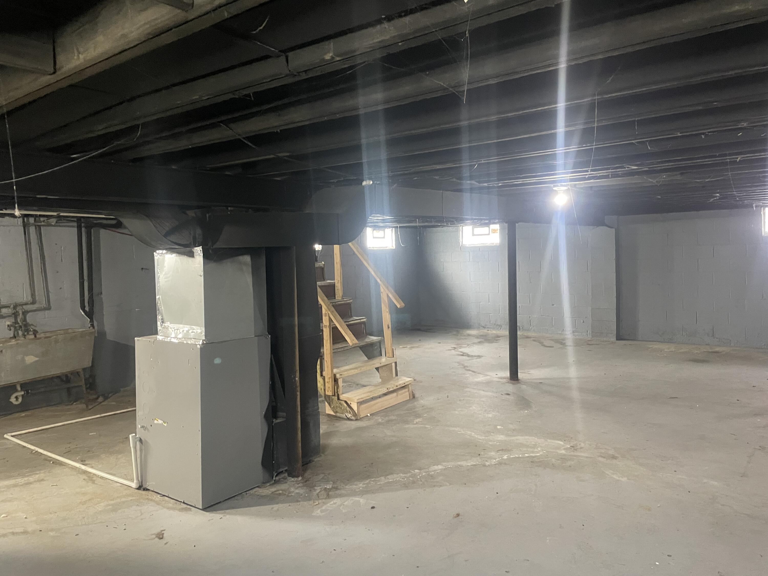 4203 East 12th Place Gary, IN 46403 - Photo 15 of 15 a view of a hallway with wooden cabinets