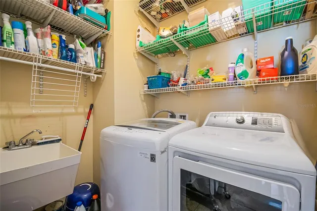 a utility room with dryer and washer