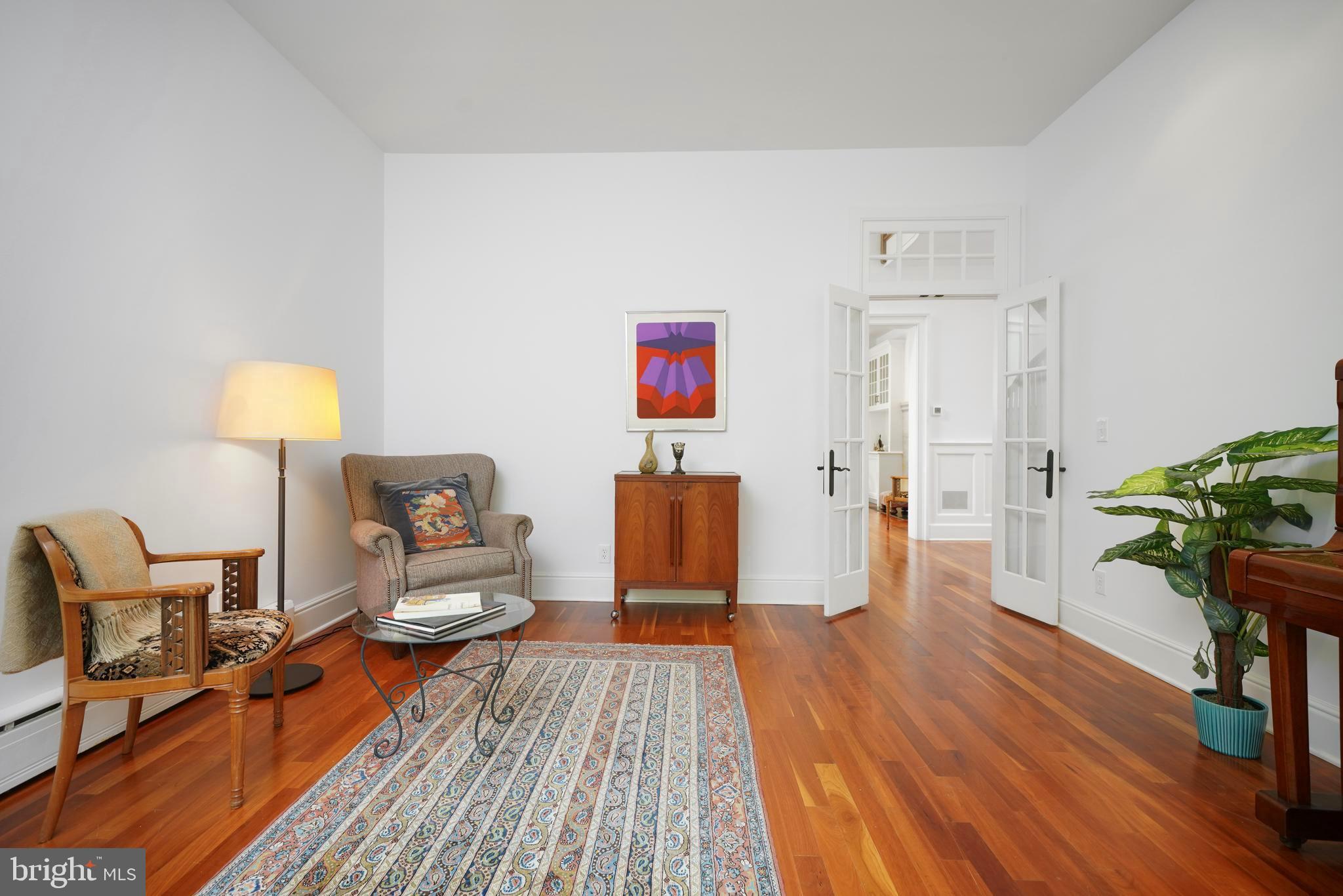 350 State Road Princeton, NJ 08540 - Photo 17 of 43 Living room with glass French doors off foyer.