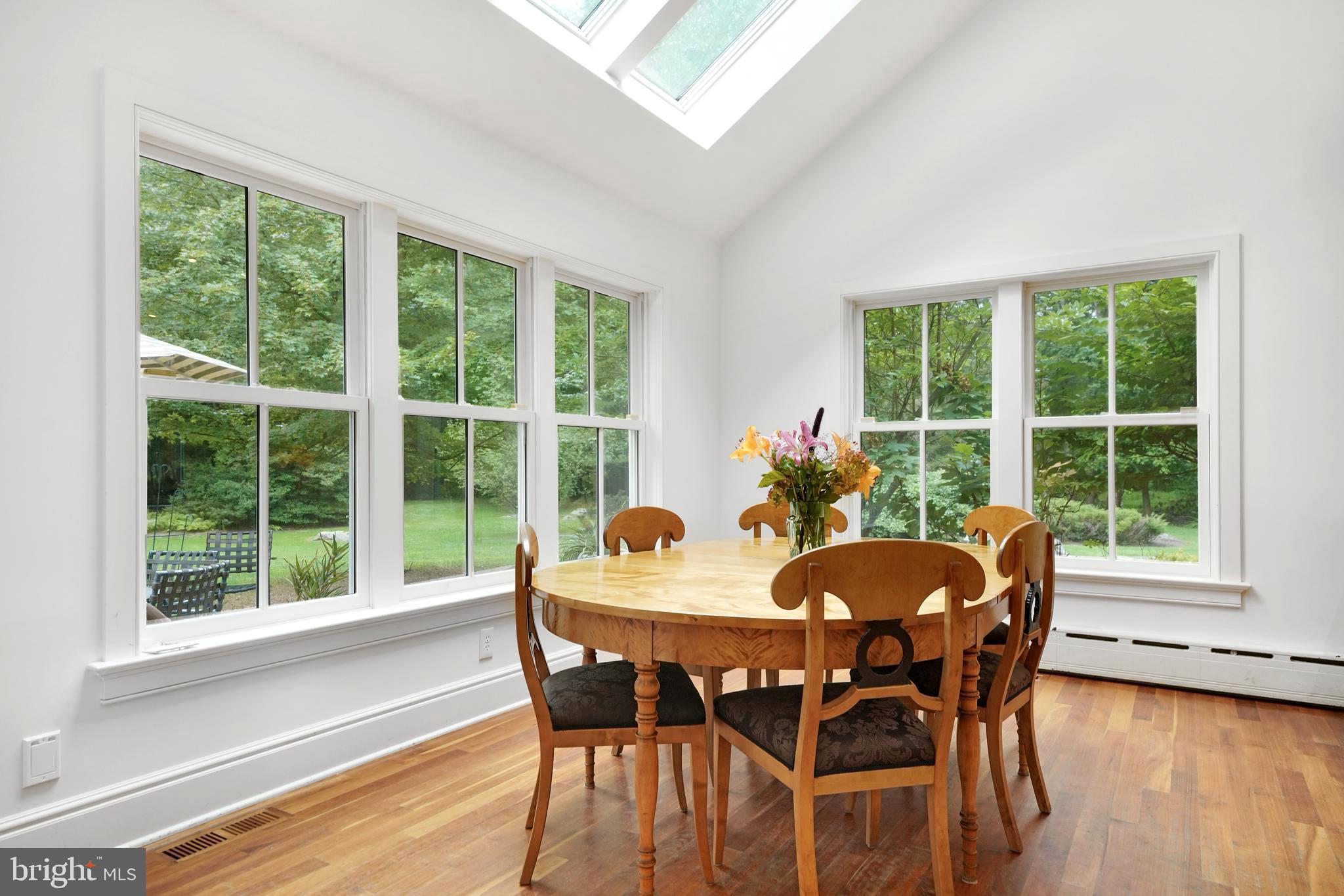 350 State Road Princeton, NJ 08540 - Photo 9 of 43 Dining area with floor and ceiling windows.