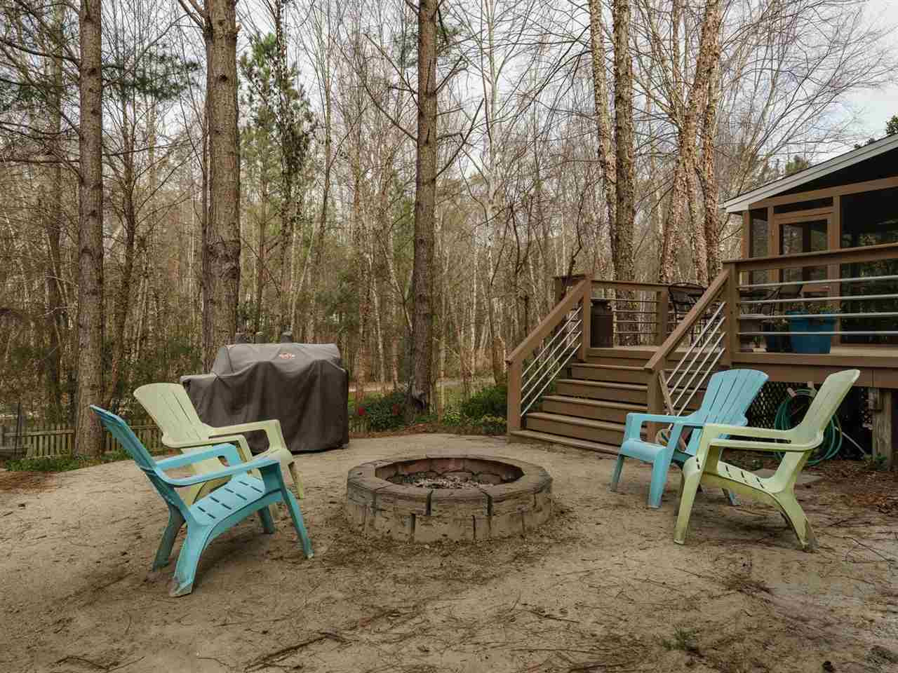 1105 Patterson Grove Road Apex, NC 27502 - Photo 22 of 25 There is an abundance of outdoor entertaining space at this wonderful property. Fire Pit