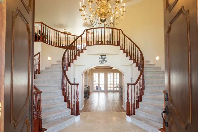 a view of entryway with wooden floor