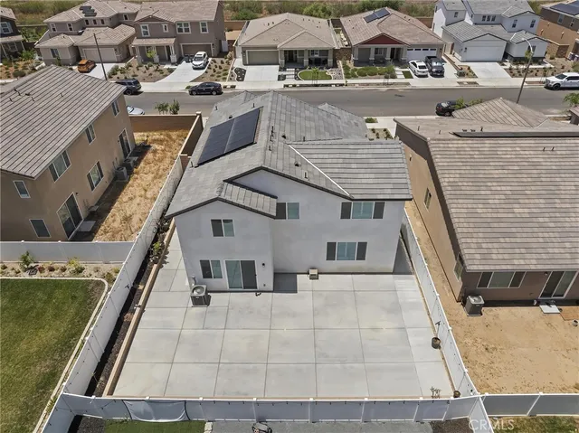 a aerial view of a house with a ocean view