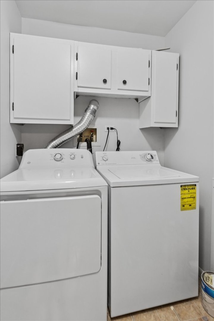 1601 Thames Court, Unit A Wheaton, IL 60189 - Photo 17 of 21 a utility room with dryer and washer