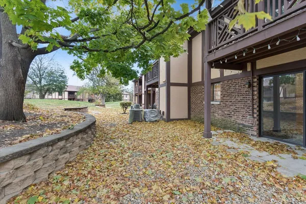 a view of a backyard of the house